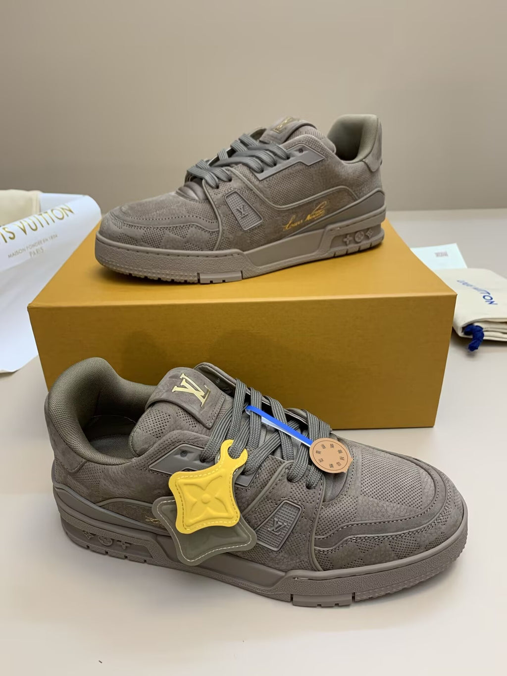 Gray suede and mesh sneakers with lace-up closure