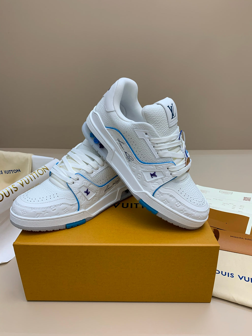 White Low-Top Sneakers with Blue Trim