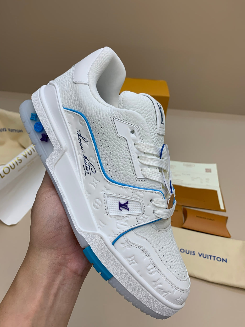 White Low-Top Sneakers with Blue Trim