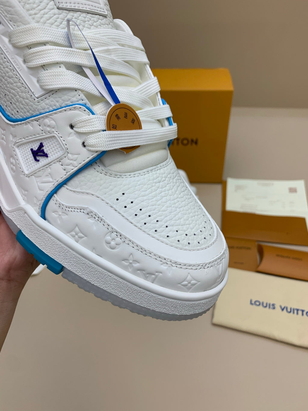 White Low-Top Sneakers with Blue Trim