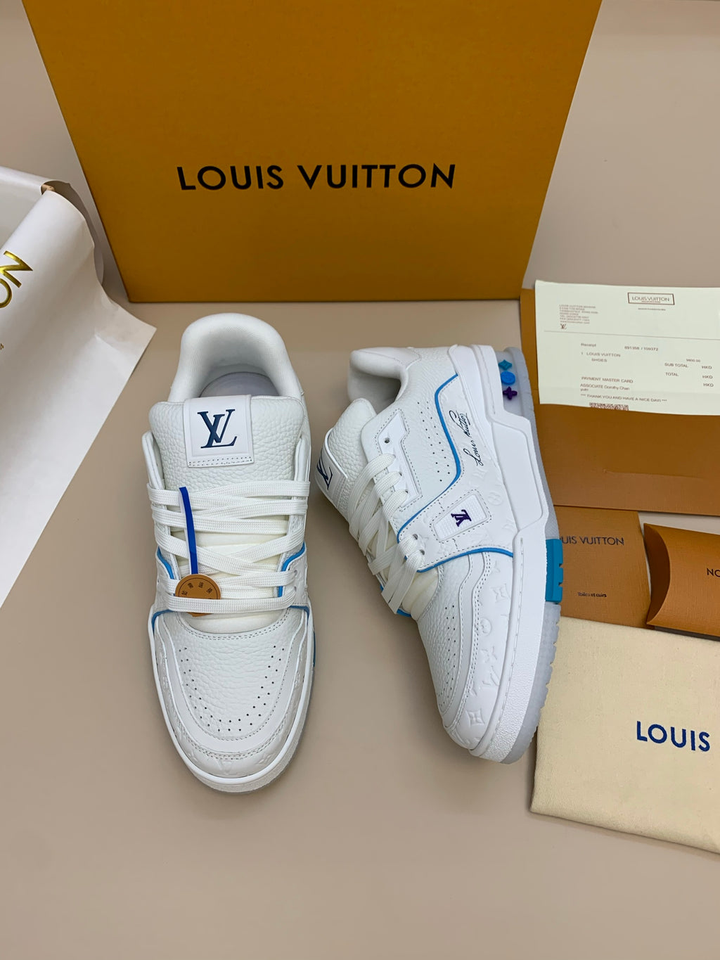White Low-Top Sneakers with Blue Trim