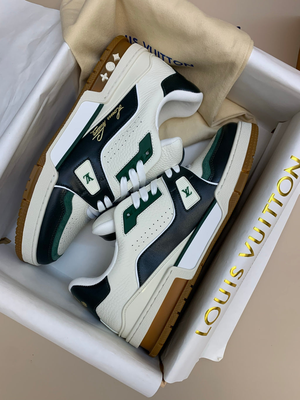 White and Black Leather Sneakers with Green Accents