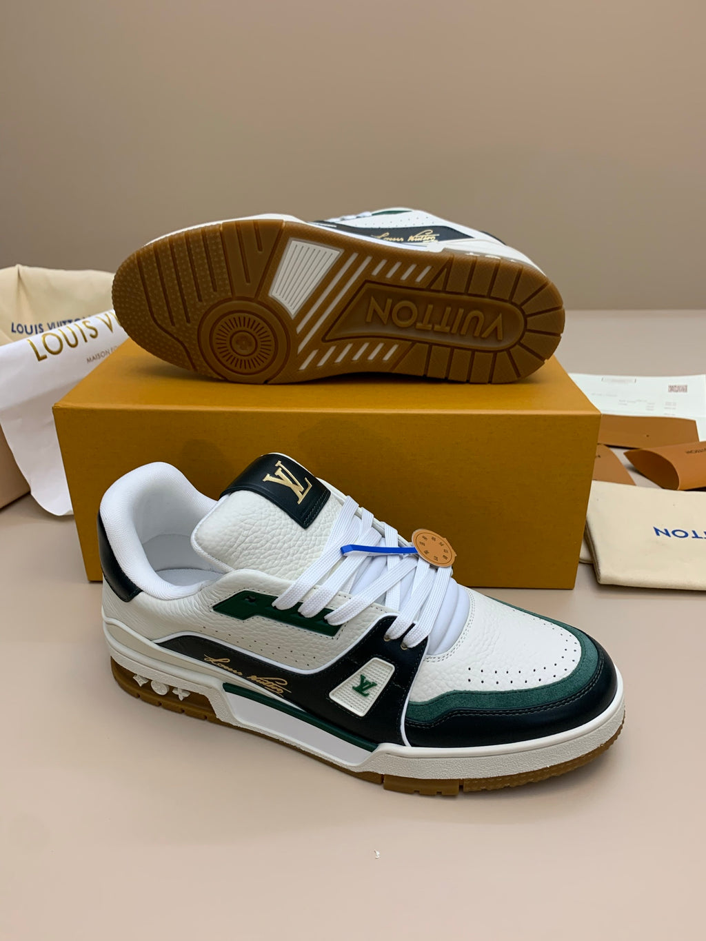 White and Black Leather Sneakers with Green Accents