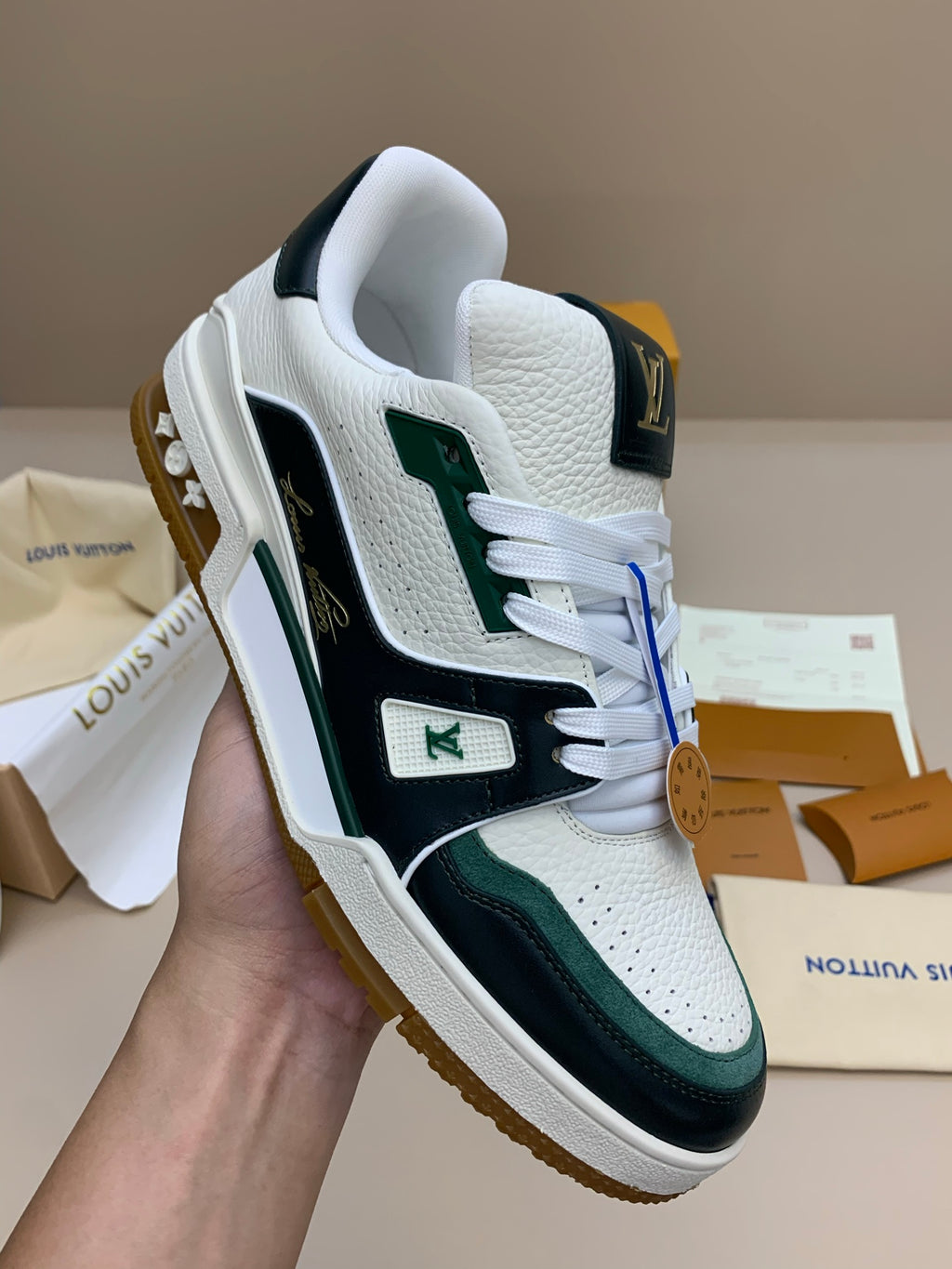 White and Black Leather Sneakers with Green Accents