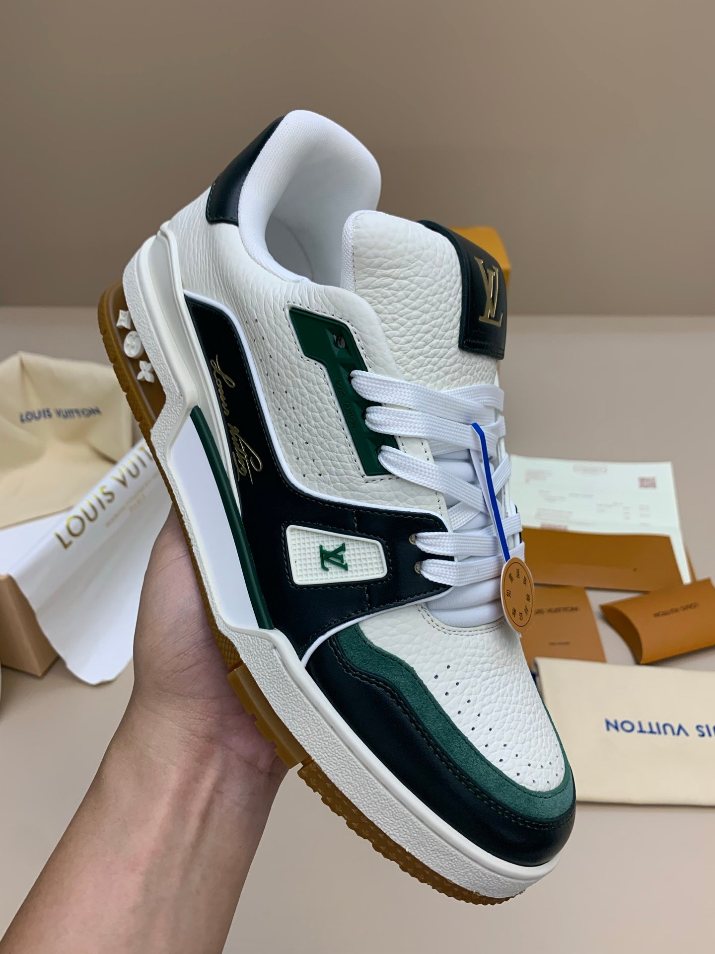 White and Black Leather Sneakers with Green Accents