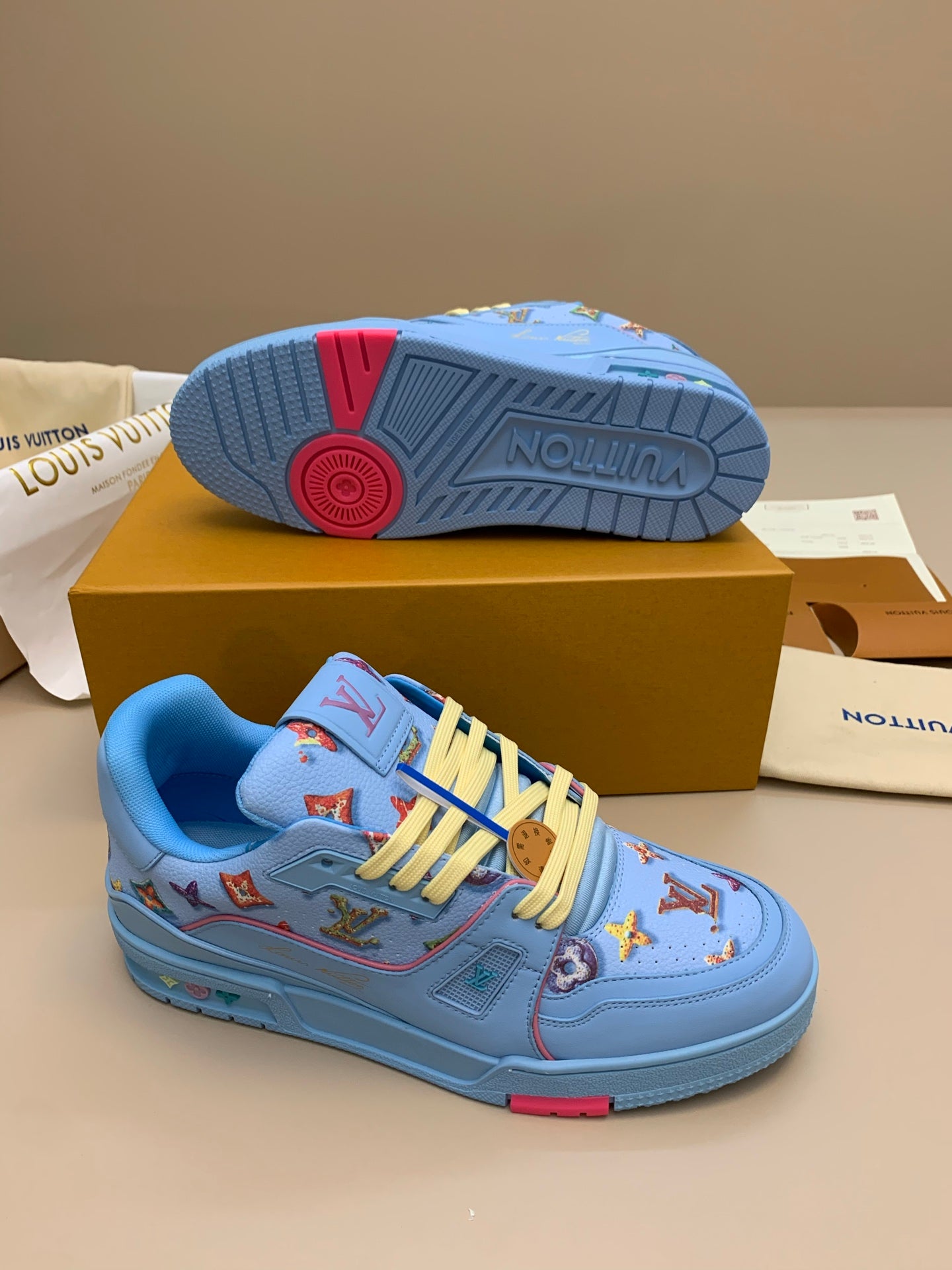 Light Blue Patterned Sneakers with Colorful Patches
