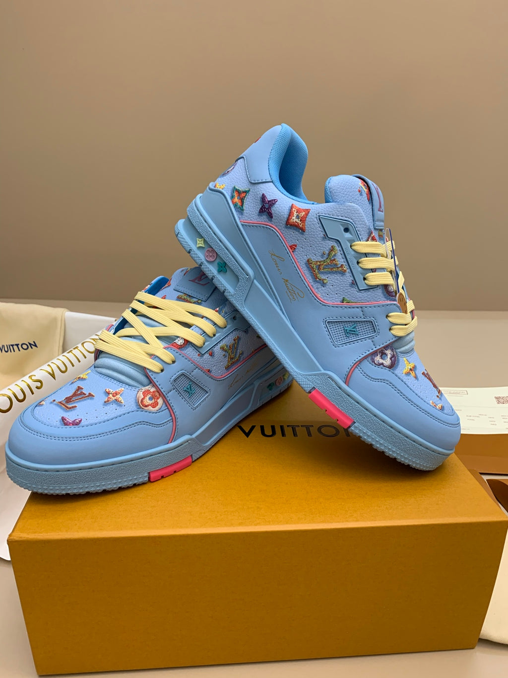 Light Blue Patterned Sneakers with Colorful Patches