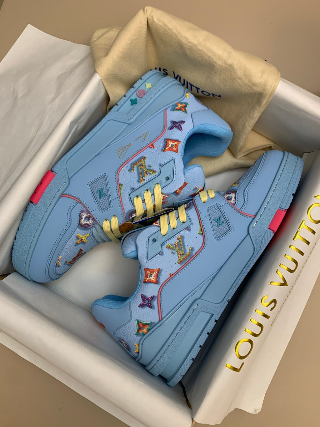 Light Blue Patterned Sneakers with Colorful Patches