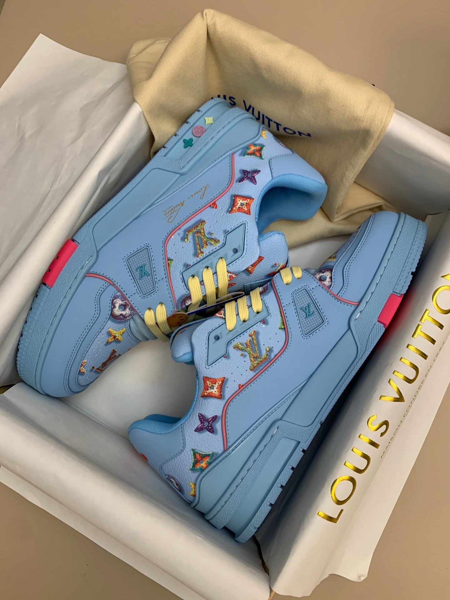 Light Blue Patterned Sneakers with Colorful Patches