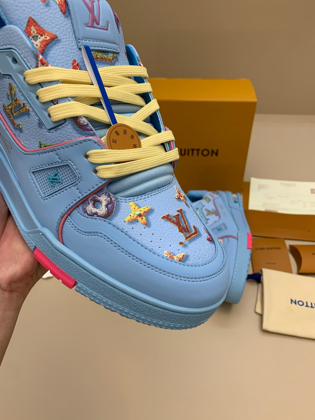 Light Blue Patterned Sneakers with Colorful Patches