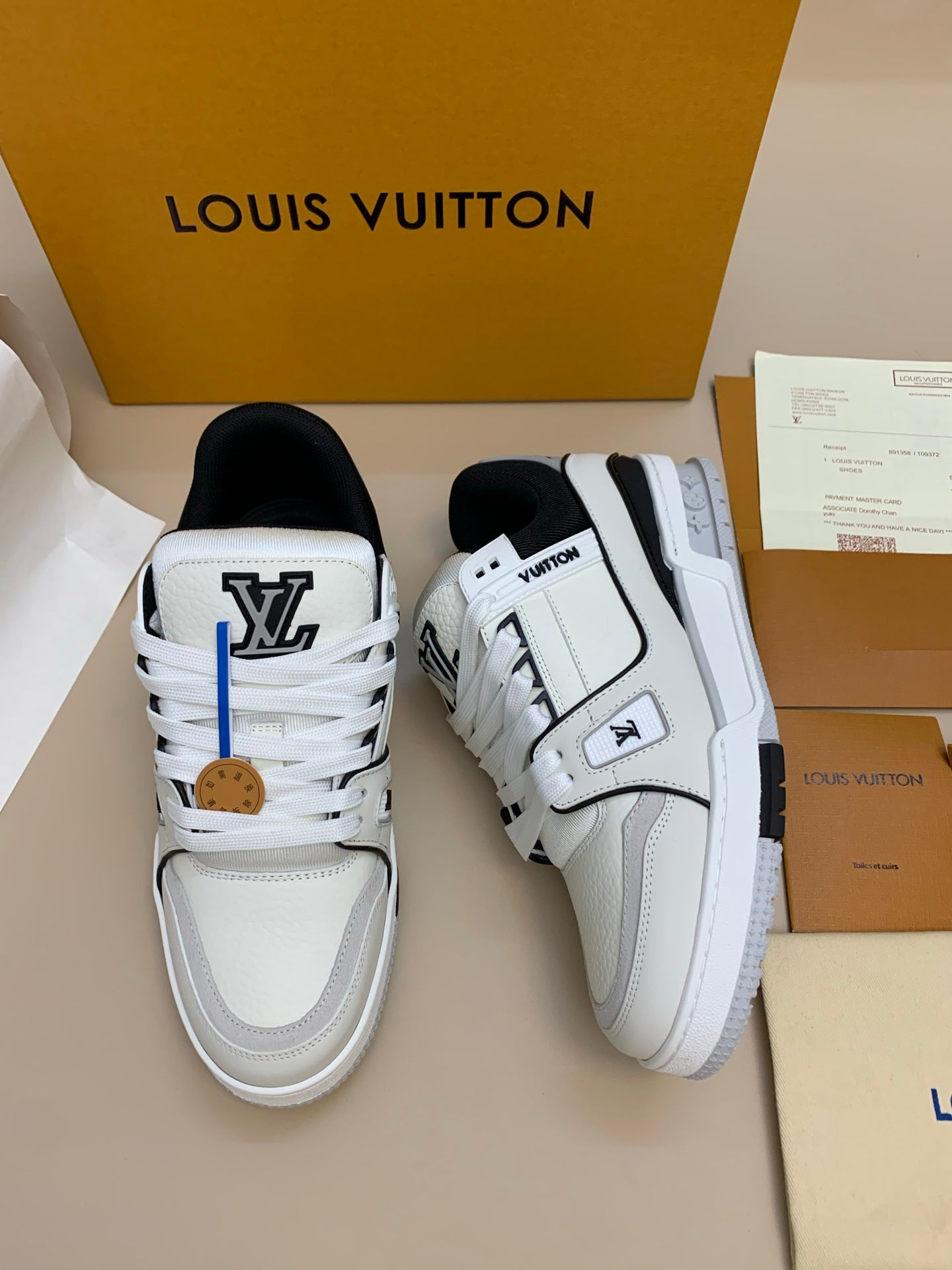White Leather Sneakers with Black Accents