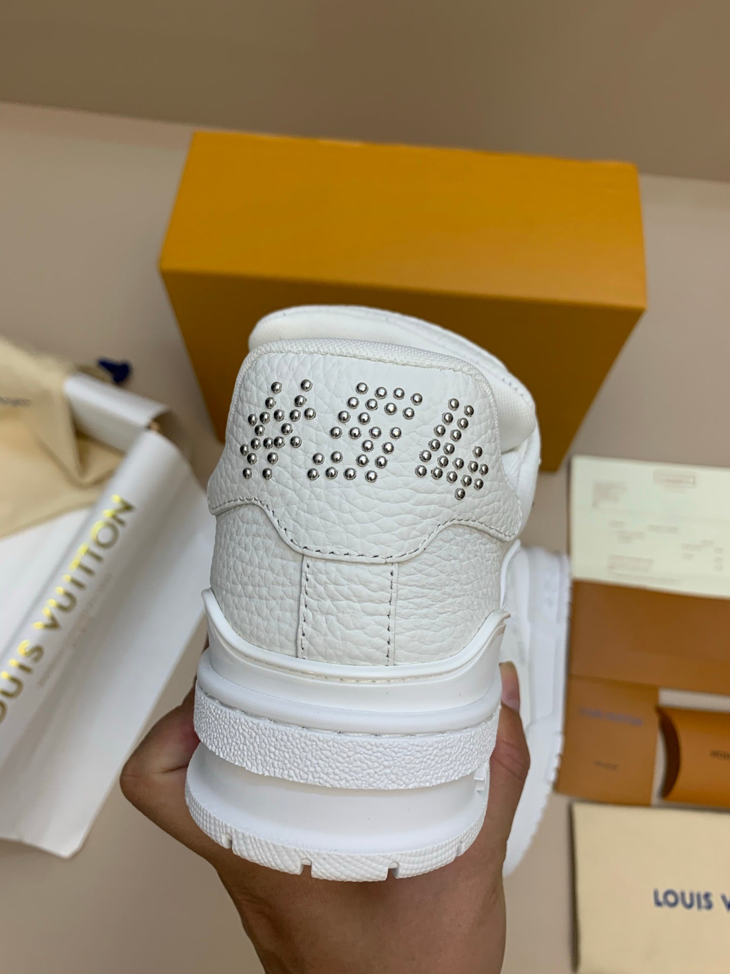 White Low-Top Sneakers with Silver Studs