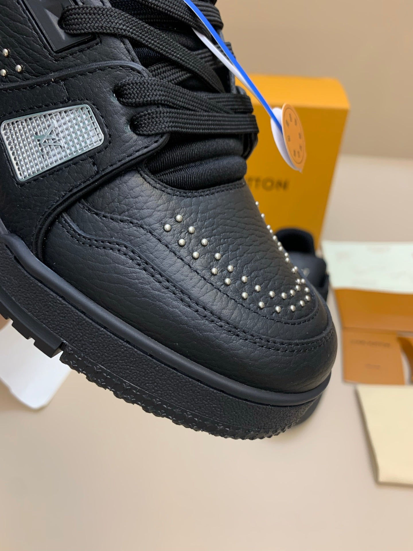 Black Leather Sneakers with Studded Detailing