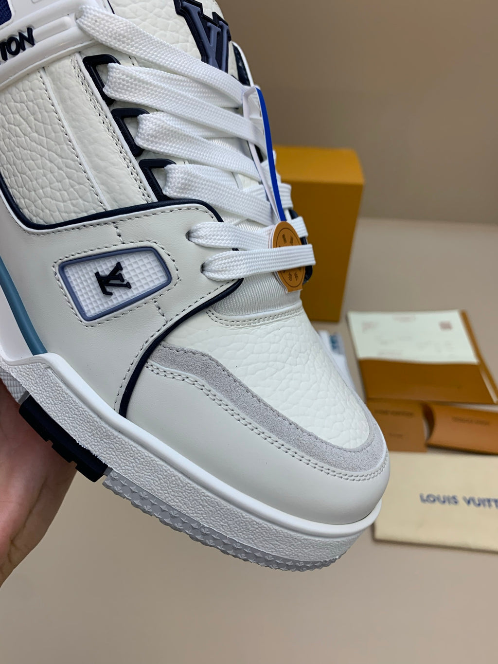 White Mid-Top Sneakers with Navy and Gray Accents
