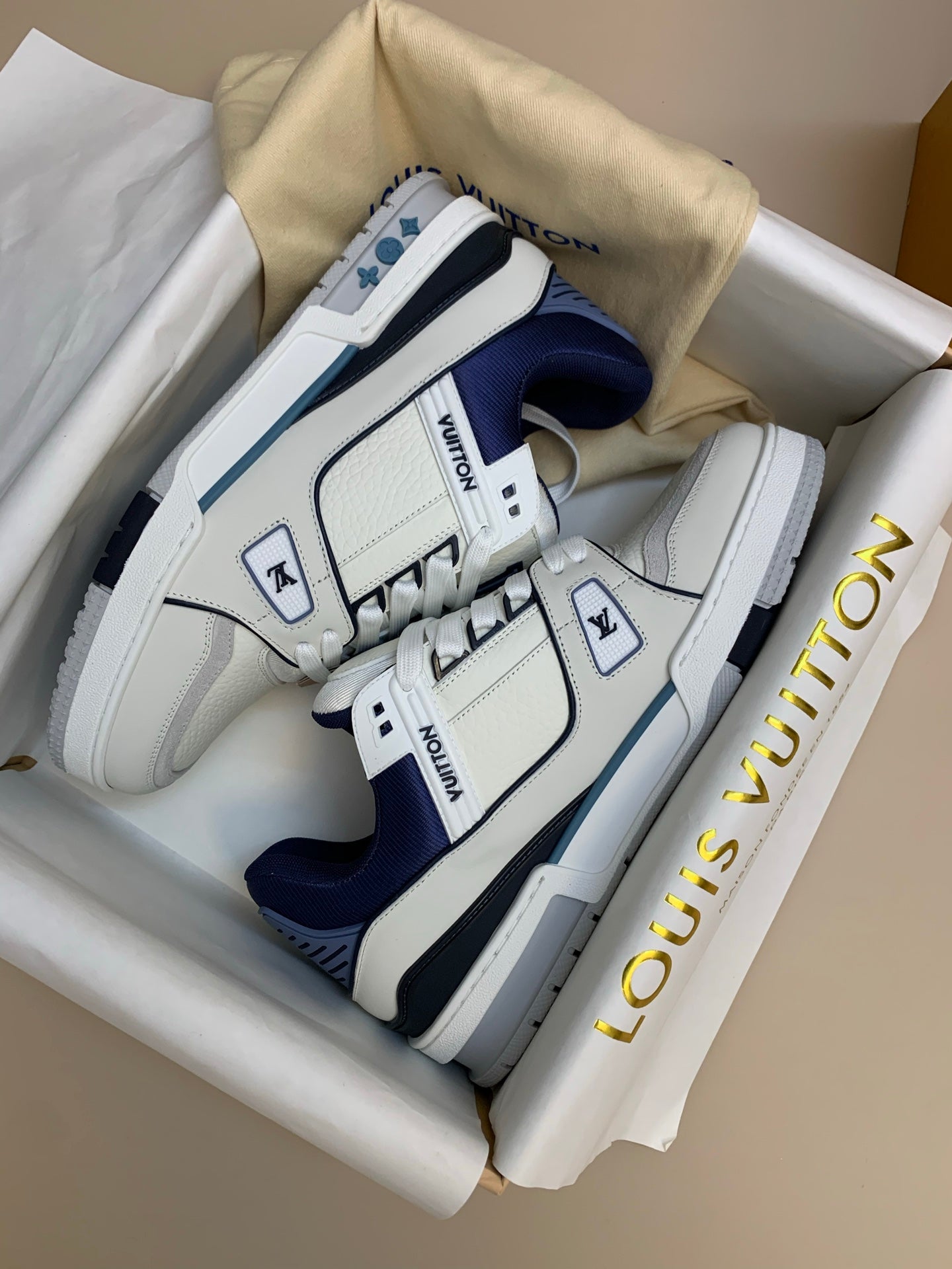 White Mid-Top Sneakers with Navy and Gray Accents
