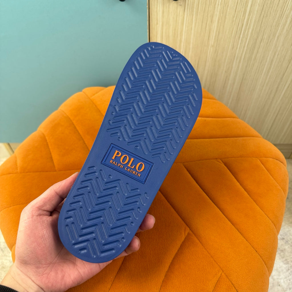 Blue Slide Sandals with Orange Accent - Outsole view
