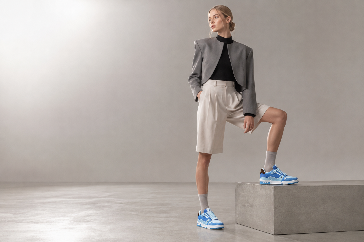 Model wearing selected footwear in an editorial fashion setting