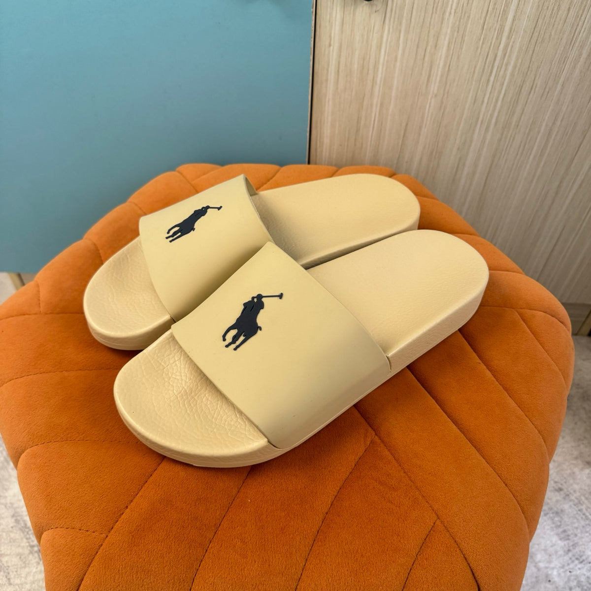Cream Slide Sandals with Embossed Logo - Left side view