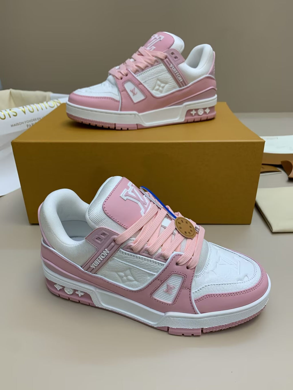 White and pink casual sneakers with side strap
